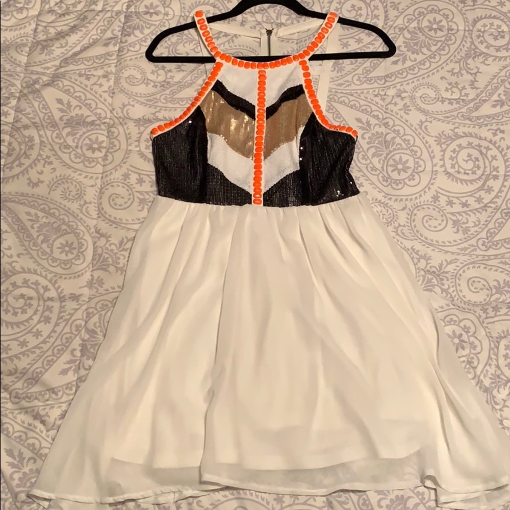 White dress with black and gold glitter